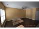 Spacious living room with hardwood floors and neutral walls at 7765 Haynes Park Cir, Lithonia, GA 30038