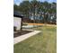 Lush backyard featuring a private pool area, mature trees, and well-maintained lawn at 839 Braselton Hwy, Lawrenceville, GA 30043
