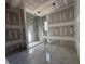 Bathroom with marble tile shower and gray tile flooring, awaiting fixtures and final touches at 839 Braselton Hwy, Lawrenceville, GA 30043