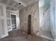 Partially finished bathroom with marble style tile in the shower at 839 Braselton Hwy, Lawrenceville, GA 30043