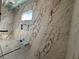 The new bathroom boasts an elegant tile shower and a built-in shower seat at 839 Braselton Hwy, Lawrenceville, GA 30043