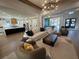 Expansive living room featuring an open-concept design, blending living, dining, and kitchen spaces for seamless entertaining at 839 Braselton Hwy, Lawrenceville, GA 30043