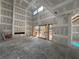 Grand living room with soaring ceilings and large sliding doors, waiting for design and customization at 839 Braselton Hwy, Lawrenceville, GA 30043