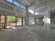 Spacious living room with soaring ceilings, large windows, and sliding glass doors, ready for customization at 839 Braselton Hwy, Lawrenceville, GA 30043