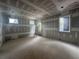 Spacious living room showcasing large windows for natural light and unfinished walls at 839 Braselton Hwy, Lawrenceville, GA 30043