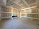 The living room is unfinished with a fireplace showing the final stages of construction at 839 Braselton Hwy, Lawrenceville, GA 30043