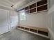 Mudroom features a built-in bench with storage cubbies and hooks at 839 Braselton Hwy, Lawrenceville, GA 30043