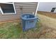 Backyard view of an AC unit at 518 Firethorn Ct, Villa Rica, GA 30180