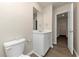 Simple bathroom with toilet and vanity at 518 Firethorn Ct, Villa Rica, GA 30180