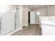 Modern bathroom with a walk-in shower and double vanity at 518 Firethorn Ct, Villa Rica, GA 30180