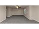 Bright bedroom featuring neutral walls and carpet at 518 Firethorn Ct, Villa Rica, GA 30180