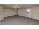 Spacious bedroom with neutral carpeting and ceiling fan at 518 Firethorn Ct, Villa Rica, GA 30180
