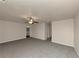 Primary bedroom with plush carpeting and access to bathroom at 518 Firethorn Ct, Villa Rica, GA 30180