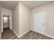 Entryway with half-bath and wood-look flooring at 518 Firethorn Ct, Villa Rica, GA 30180