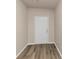 Light-filled entryway with wood-look flooring and neutral walls at 518 Firethorn Ct, Villa Rica, GA 30180