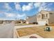 Houses with driveways and lawns in a residential neighborhood at 518 Firethorn Ct, Villa Rica, GA 30180