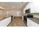 Open concept kitchen with stainless steel appliances and granite countertops at 518 Firethorn Ct, Villa Rica, GA 30180