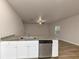 Modern kitchen features stainless steel appliances and granite countertops at 518 Firethorn Ct, Villa Rica, GA 30180