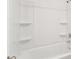 Clean bathroom featuring a shower and tub with white tub surround at 7260 Eton Ln, Locust Grove, GA 30248
