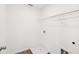 Laundry room features a shelf, washer hookup, and light-colored vinyl flooring at 7260 Eton Ln, Locust Grove, GA 30248