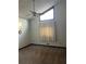 Bedroom features vaulted ceiling, fan and large window with natural light at 3557 Clubhouse Ln, Conyers, GA 30094