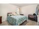 Cozy bedroom with a comfortable bed and ample space at 7787 Richmond Trl, Fairburn, GA 30213