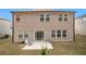 Two-story brick home with backyard patio at 7787 Richmond Trl, Fairburn, GA 30213