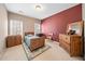 Bright bedroom with wood furniture and accent wall at 1340 Cascade Falls Sw Dr, Atlanta, GA 30311