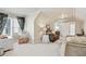 Large bedroom with sitting area, and access to another room at 2041 Democracy Dr, Buford, GA 30519