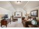 Spacious bedroom with sitting area and plenty of natural light at 2041 Democracy Dr, Buford, GA 30519