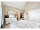 Main bedroom with white dresser, TV, and view of en-suite bathroom at 2041 Democracy Dr, Buford, GA 30519