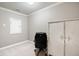 Basement office with carpeted floor and built-in storage at 2041 Democracy Dr, Buford, GA 30519