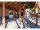 Brick patio under deck with access to basement at 2041 Democracy Dr, Buford, GA 30519