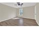 Bright bedroom with great new floors and a window with a view of the outdoors at 2707 Country Park Se Dr, Smyrna, GA 30080