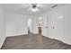 Spacious bedroom with new floors and views into the dining area and a bathroom at 2707 Country Park Se Dr, Smyrna, GA 30080