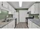Efficient kitchen features white cabinets, updated appliances, and great countertop space at 2707 Country Park Se Dr, Smyrna, GA 30080