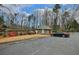 Club house at the community pool with manicured bushes and a red bench at 2707 Country Park Se Dr, Smyrna, GA 30080