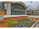 Elegant Country Park condominiums sign with lush flower bed, a prestigious and privately owned community at 2707 Country Park Se Dr, Smyrna, GA 30080