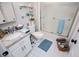 Cozy bathroom with modern fixtures, granite vanity and decorative glass shelving at 706 Berry Ct, Villa Rica, GA 30180
