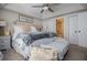 Relaxing bedroom featuring large bed, soft textures, and neutral decor at 706 Berry Ct, Villa Rica, GA 30180