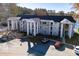 Three story building with parking lot in front, offering multiple balconies and lake views at 706 Berry Ct, Villa Rica, GA 30180