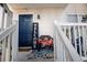 Inviting front porch with welcome sign, a chair, and decor, creating a warm and hospitable entryway to the home at 706 Berry Ct, Villa Rica, GA 30180