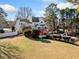 House with deck, pergola, pool, and large grassy backyard at 125 Hillcrest Trce, Fayetteville, GA 30215