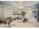 Basement gym with exercise equipment and a window with a view of the backyard at 125 Hillcrest Trce, Fayetteville, GA 30215