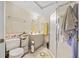 Small bathroom with shower and grey vanity at 125 Hillcrest Trce, Fayetteville, GA 30215