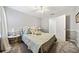 Cozy bedroom with light green walls and ceiling fan at 125 Hillcrest Trce, Fayetteville, GA 30215