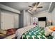 Bedroom with a large bed and access to the living room at 125 Hillcrest Trce, Fayetteville, GA 30215