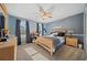 Bright bedroom with ceiling fan and ample closet space at 125 Hillcrest Trce, Fayetteville, GA 30215