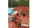 Relaxing deck with pergola, pool view, and comfortable seating at 125 Hillcrest Trce, Fayetteville, GA 30215