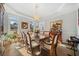 Dining room with large windows, hardwood floors, decorative molding and elegant furniture. Perfect for Gathering gatherings at 125 Hillcrest Trce, Fayetteville, GA 30215
